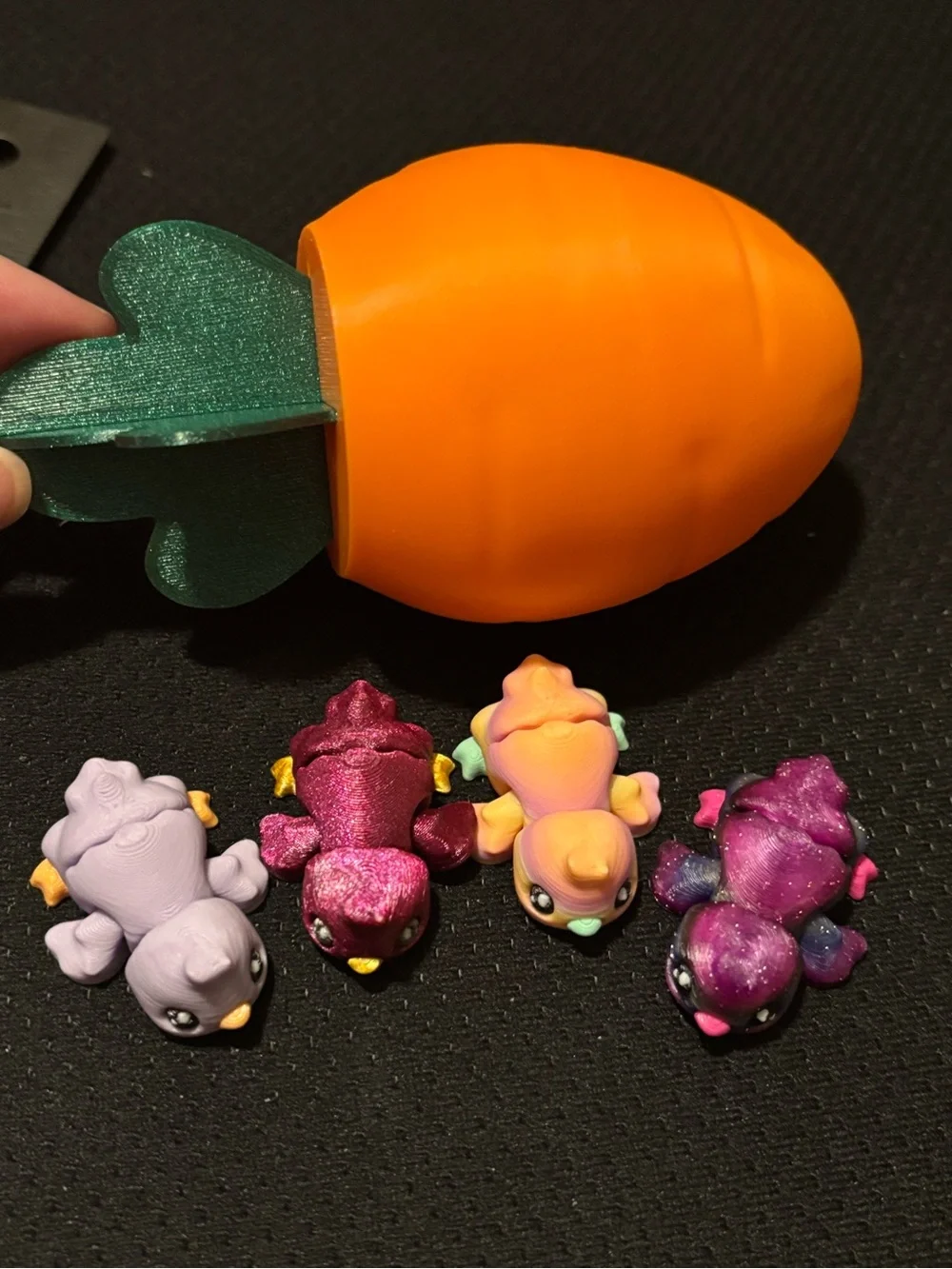 3D printed carrot container with 4 chicks